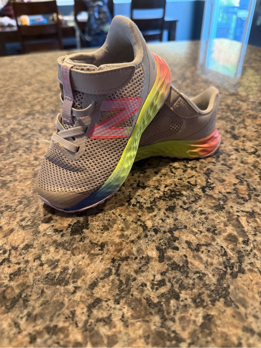 New Balance Kids Gray Sneakers with Rainbow Gradient Sole